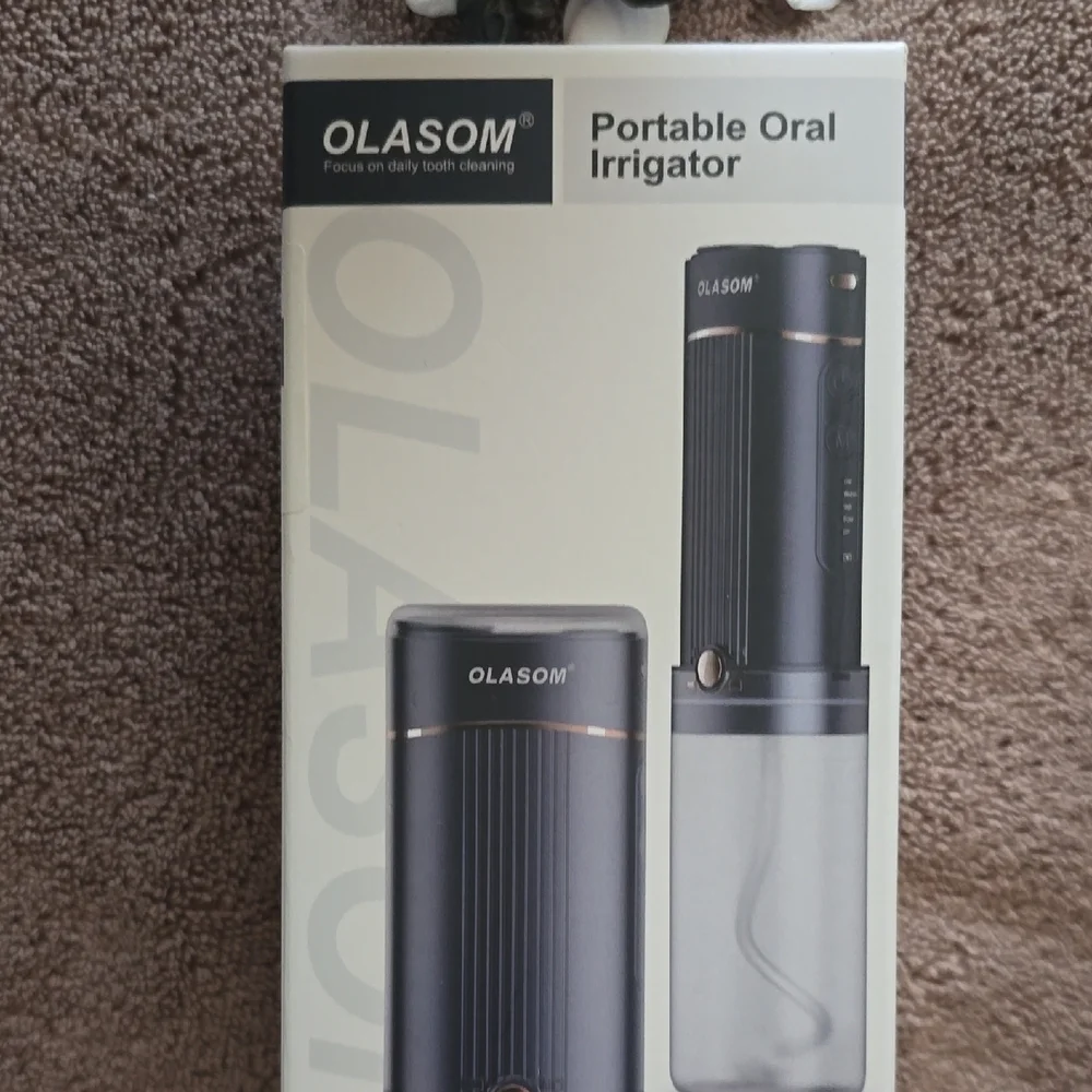 Olasom. Portable Oral Irrigator in White